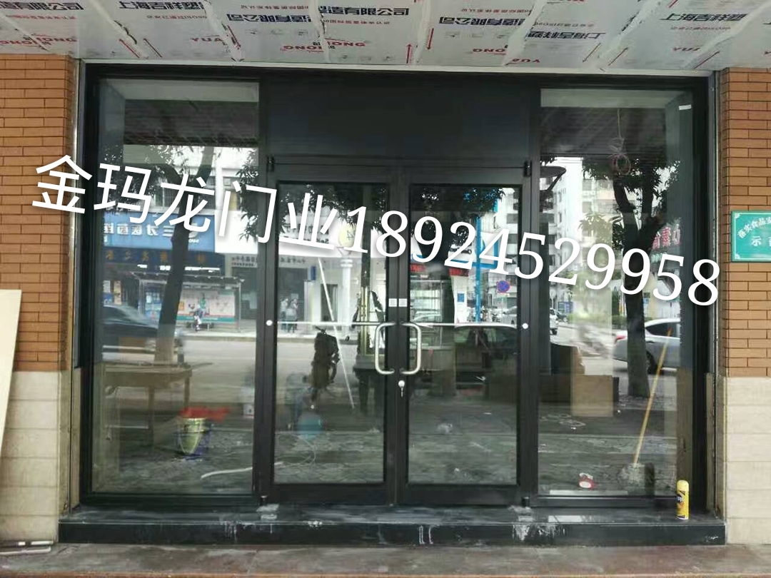 门业图片-肯德基门深圳铝合金玻璃地弹门-肯德基门厂家供应1900*2300*55图片
